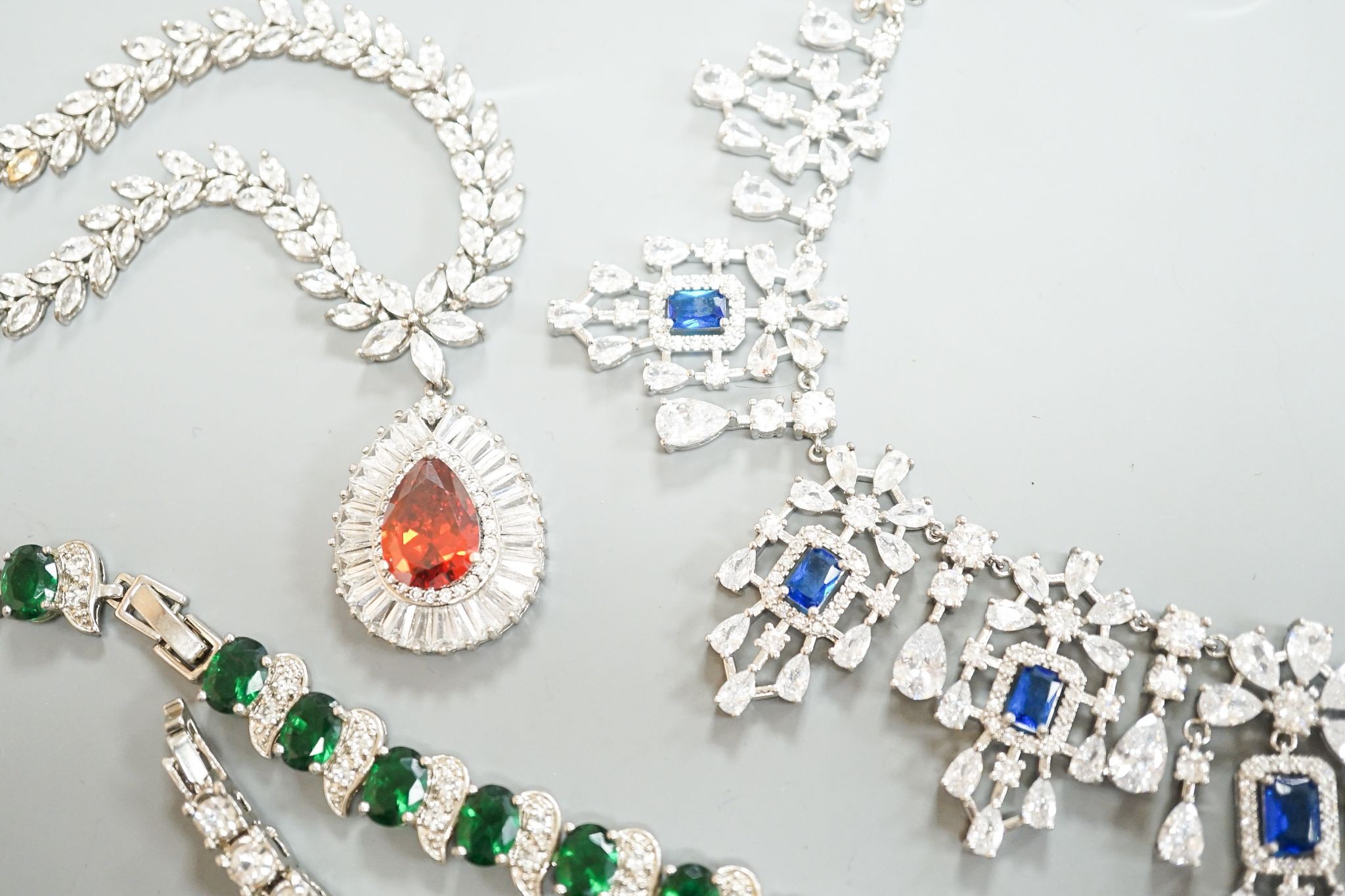 A small group of 925 or white metal and paste set jewellery, including necklaces, bracelets and earrings.